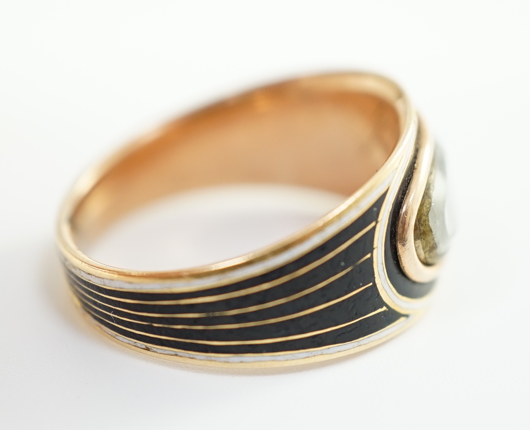 A George IV gold and two colour enamel mourning ring